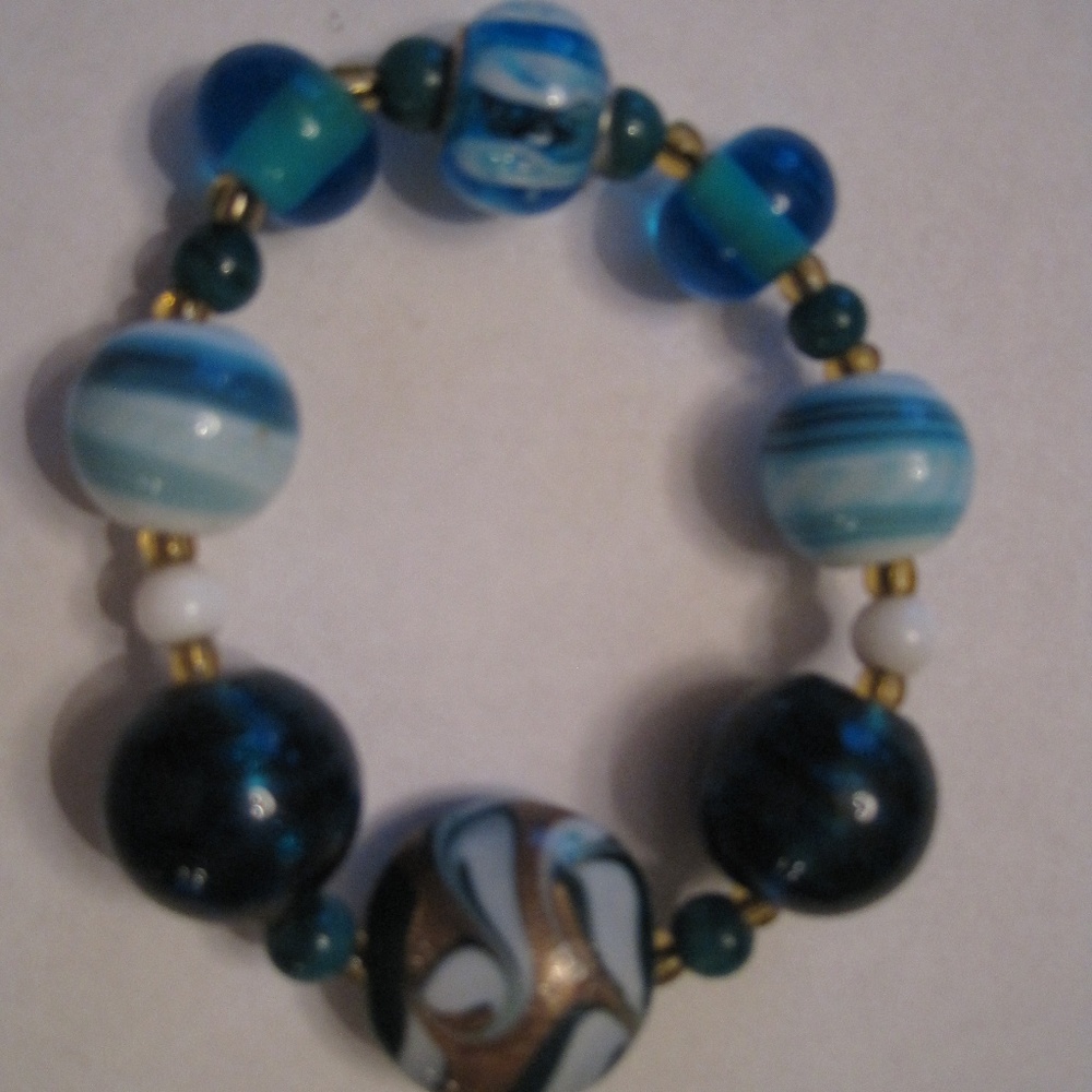 Turquoise and Gold hand beaded stretch bracelet